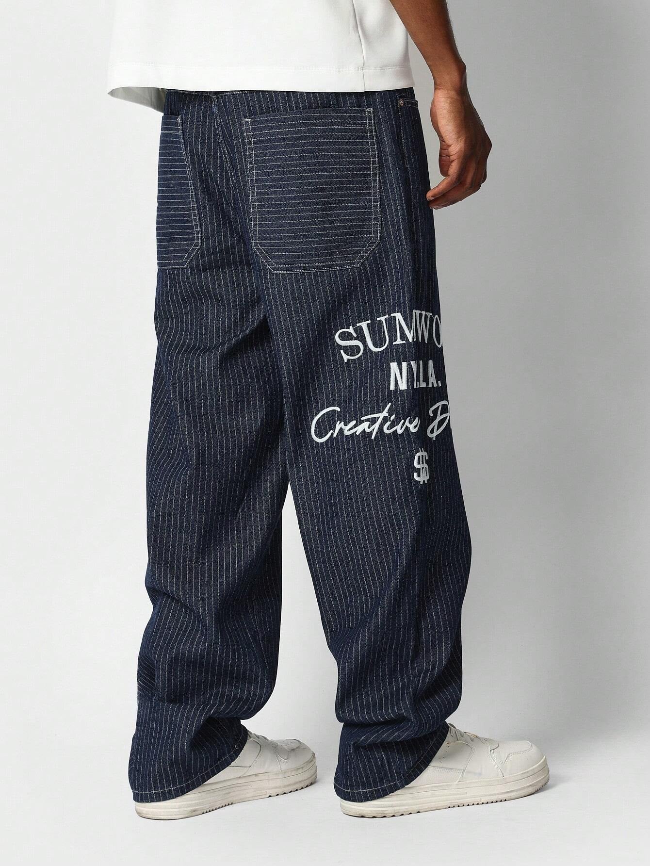 Calça Denim reta com bordado