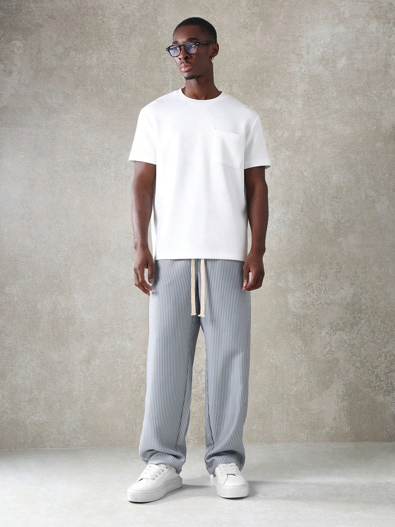 Calça Listrada Blues